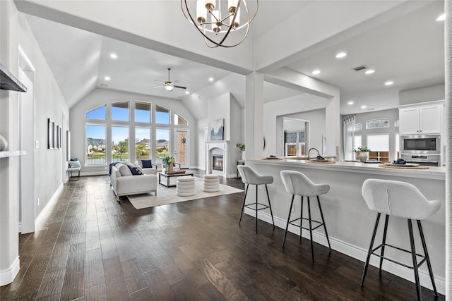 1128 Lake Hills Trl, Roanoke, TX 76262 - living area featuring dark wood finished floors, ceiling fan, a chandelier, recessed lighting, and baseboards
