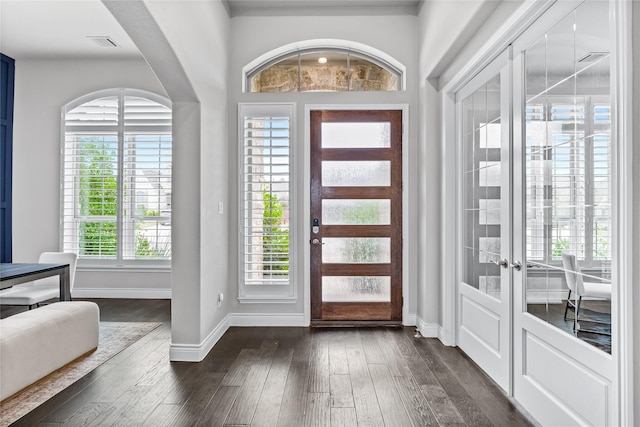 1128 Lake Hills Trl, Roanoke, TX 76262 - foyer entrance featuring french doors, dark wood-style floors, and baseboards