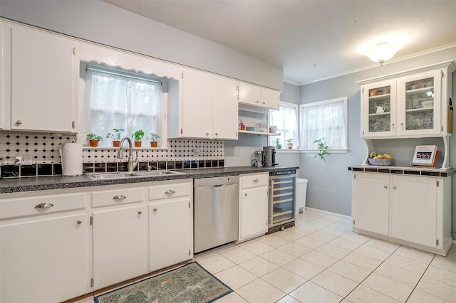 4016 El Campo Ave, Fort Worth, TX 76107 - kitchen with beverage cooler, dishwasher, a sink, decorative backsplash, and white cabinetry