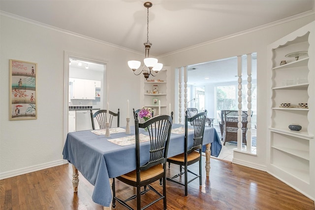 4016 El Campo Ave, Fort Worth, TX 76107 - dining area featuring built in features, ornamental molding, wood finished floors, and baseboards