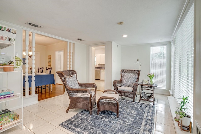 4016 El Campo Ave, Fort Worth, TX 76107 - living area with light tile patterned flooring and ornamental molding