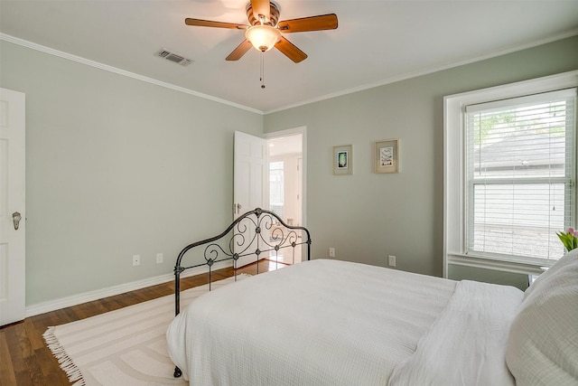 4016 El Campo Ave, Fort Worth, TX 76107 - bedroom with wood finished floors, ornamental molding, baseboards, and a ceiling fan