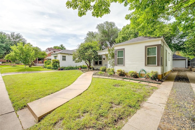 4016 El Campo Ave, Fort Worth, TX 76107 - view of front facade featuring a front yard, a detached garage, and an outbuilding