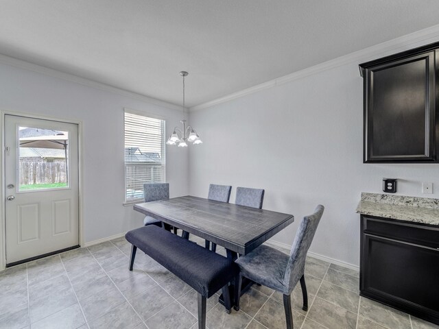 905 Jonius Creek Dr, Little Elm, TX 75068 - dining space featuring a chandelier, ornamental molding, baseboards, and light tile patterned floors