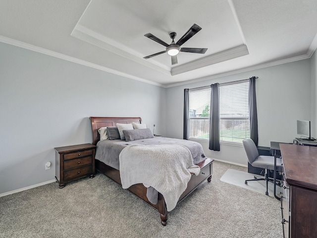 905 Jonius Creek Dr, Little Elm, TX 75068 - bedroom featuring a tray ceiling, light colored carpet, ornamental molding, and baseboards