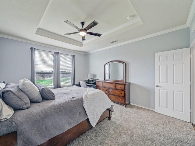 905 Jonius Creek Dr, Little Elm, TX 75068 - bedroom with a raised ceiling, crown molding, carpet floors, a ceiling fan, and baseboards