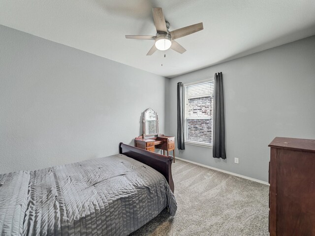 905 Jonius Creek Dr, Little Elm, TX 75068 - carpeted bedroom with baseboards and a ceiling fan