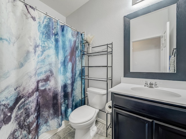 905 Jonius Creek Dr, Little Elm, TX 75068 - full bathroom with toilet, vanity, curtained shower, and a textured wall