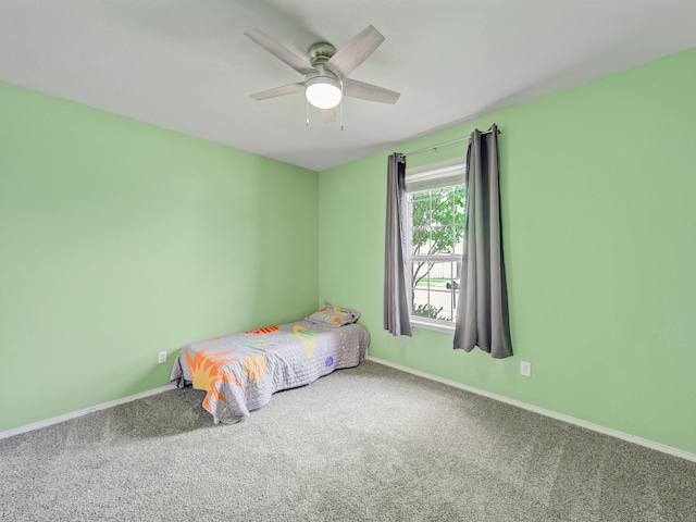 905 Jonius Creek Dr, Little Elm, TX 75068 - carpeted bedroom featuring baseboards and ceiling fan