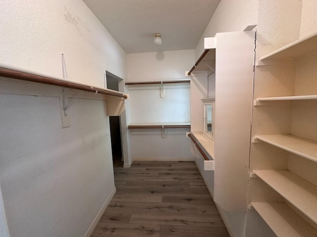 1026 Elm Dr, Providence Village, TX 76227 - walk in closet featuring wood finished floors