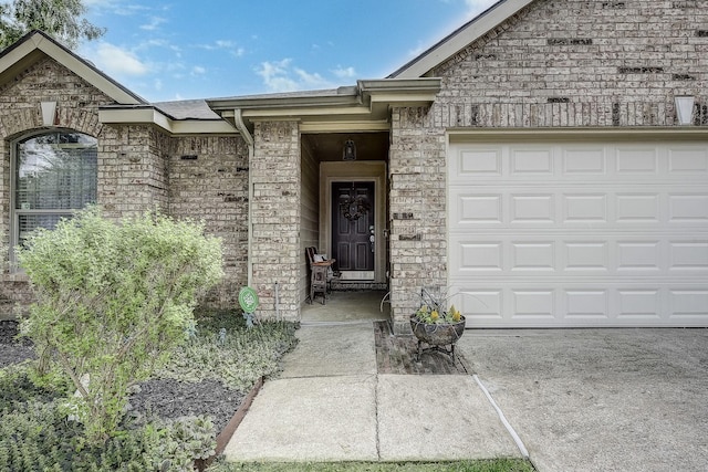 620 Cypress Hill Dr, Mckinney, TX 75071 - view of exterior entry with a garage