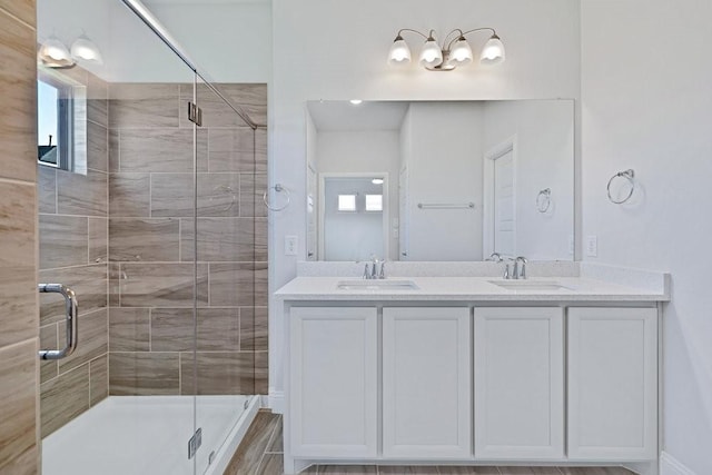 317 Boston Dr, Princeton, TX 74507 - bathroom featuring a shower stall, plenty of natural light, and double vanity