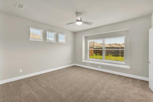 317 Boston Dr, Princeton, TX 74507 - carpeted spare room featuring baseboards and a ceiling fan