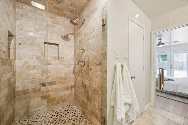 8803 Daytonia Ave, Dallas, TX 75218 - ensuite bathroom with a stall shower, french doors, and ceiling fan