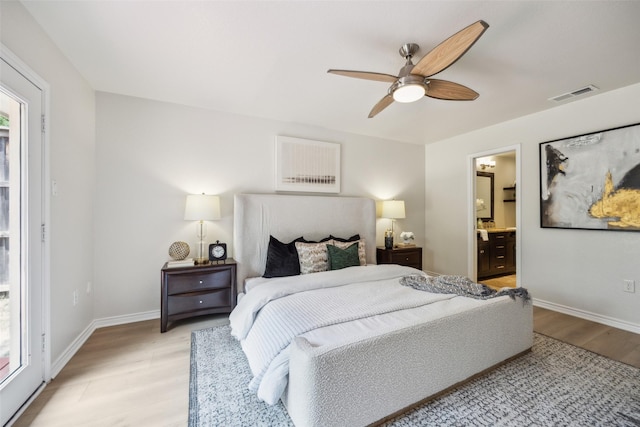 8803 Daytonia Ave, Dallas, TX 75218 - bedroom with light wood-style floors, baseboards, a ceiling fan, and connected bathroom