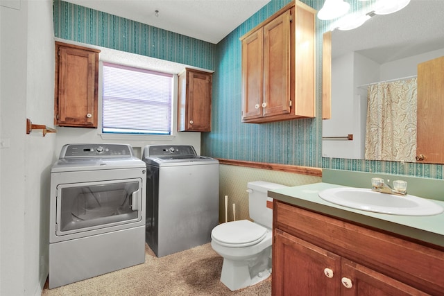 67 Melrose Cir, Denison, TX 75020 - full bath featuring wallpapered walls, washer and dryer, toilet, and vanity