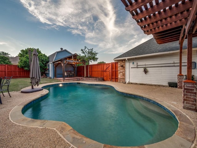 view of swimming pool with a gazebo, a fenced backyard, and a patio