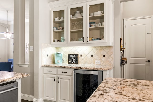 1417 Shenandoah Dr, Mckinney, TX 75071 - indoor dry bar featuring wine cooler, backsplash, hanging light fixtures, and stainless steel dishwasher