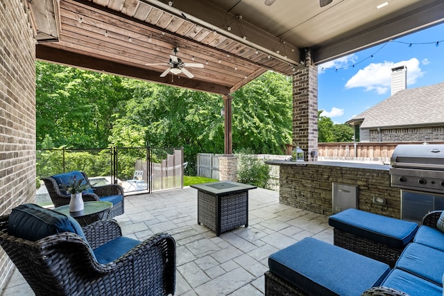 1417 Shenandoah Dr, Mckinney, TX 75071 - view of patio with exterior kitchen and a ceiling fan