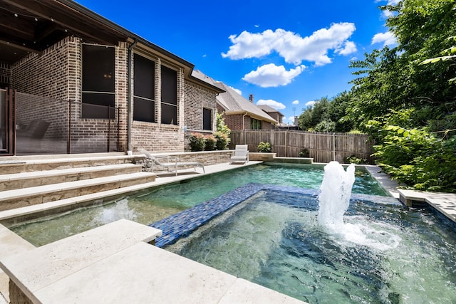 1417 Shenandoah Dr, Mckinney, TX 75071 - view of pool with a pool with connected hot tub and a fenced backyard