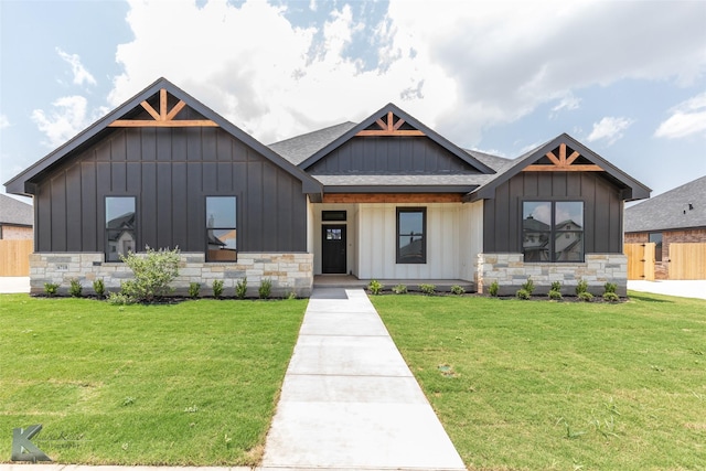 6718 Windmill Grass Ln, Abilene, TX 79606 - modern farmhouse style home featuring board and batten siding, stone siding, and roof with shingles