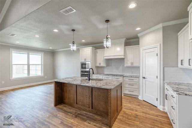 6718 Windmill Grass Ln, Abilene, TX 79606 - kitchen featuring ornamental molding, a sink, tasteful backsplash, stainless steel appliances, and recessed lighting