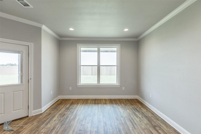 6718 Windmill Grass Ln, Abilene, TX 79606 - spare room featuring crown molding, wood finished floors, baseboards, and recessed lighting