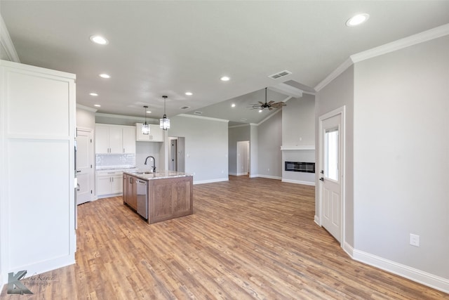 6718 Windmill Grass Ln, Abilene, TX 79606 - kitchen featuring ornamental molding, a sink, recessed lighting, a ceiling fan, and an island with sink