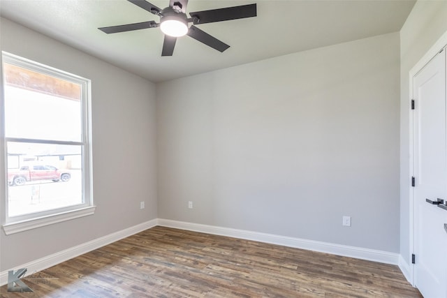 6718 Windmill Grass Ln, Abilene, TX 79606 - unfurnished room with wood finished floors, baseboards, and ceiling fan