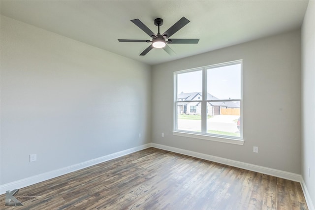 6718 Windmill Grass Ln, Abilene, TX 79606 - empty room with baseboards, wood finished floors, and a ceiling fan