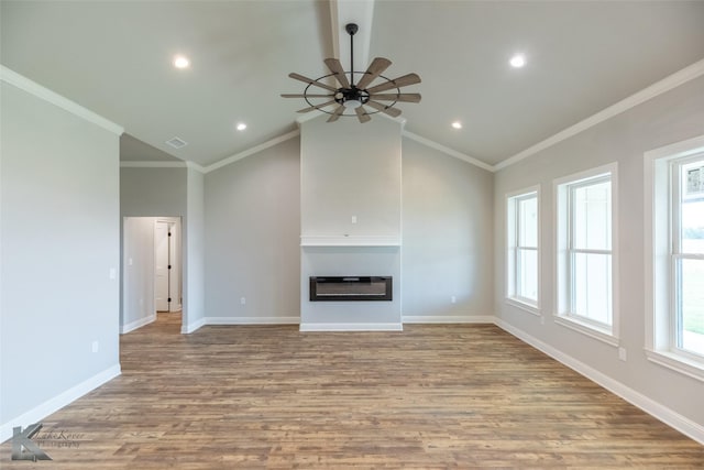 6718 Windmill Grass Ln, Abilene, TX 79606 - unfurnished living room with a glass covered fireplace, vaulted ceiling, wood finished floors, a ceiling fan, and baseboards