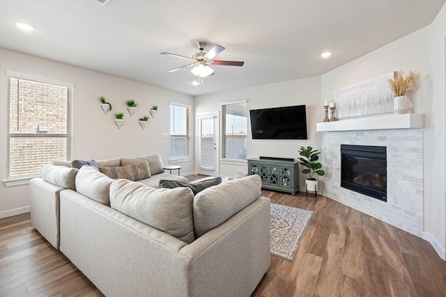 14320 Padden Park Ln, Fort Worth, TX 76262 - living room featuring baseboards, ceiling fan, a fireplace, wood finished floors, and recessed lighting