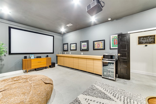 1841 Rs County Road 1402, Point, TX 75472 - cinema featuring wine cooler, concrete floors, and baseboards