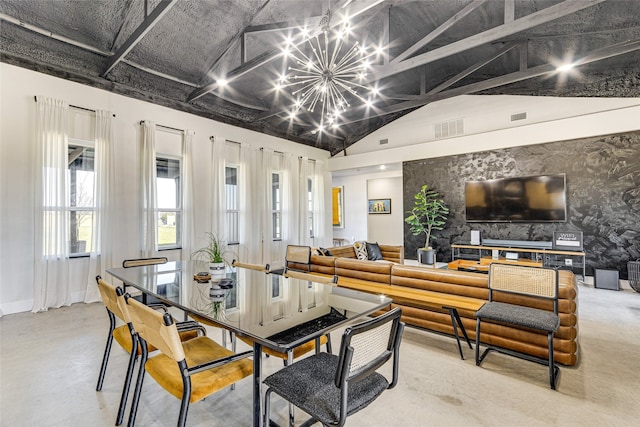 1841 Rs County Road 1402, Point, TX 75472 - dining area with finished concrete flooring, a chandelier, vaulted ceiling, and baseboards