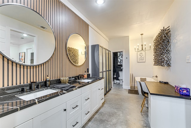 1841 Rs County Road 1402, Point, TX 75472 - bathroom featuring concrete floors, a chandelier, toilet, double vanity, and baseboards