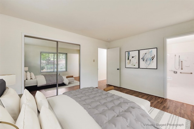 2604 Brentwood Cir, Arlington, TX 76013 - bedroom featuring wood finished floors, a closet, and connected bathroom