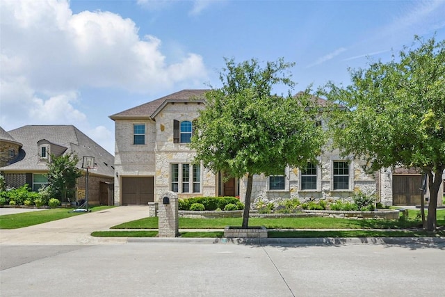 3604 Mendocino Trl, Mckinney, TX 75070 - french country home with stone siding, driveway, and a garage