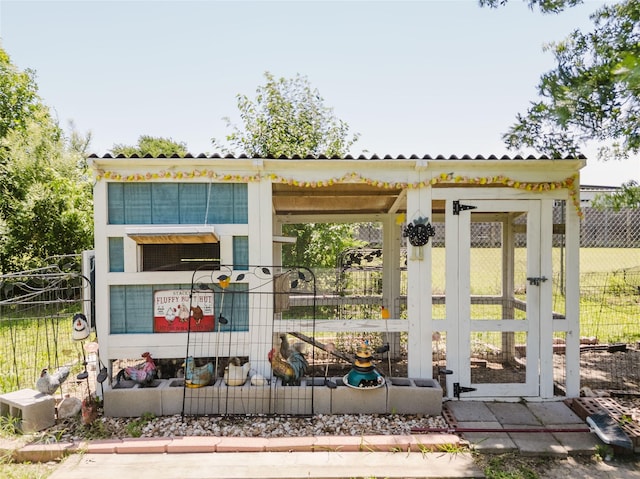 1003 E Burnett St, Ennis, TX 75119 - view of outbuilding with fence