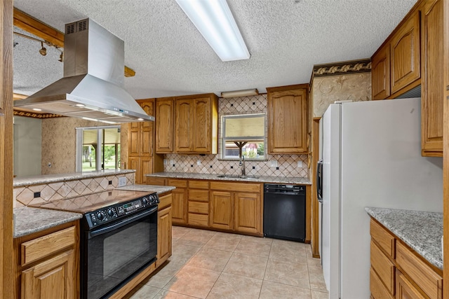 4611 Francis Ct, Granbury, TX 76049 - kitchen featuring island exhaust hood, black appliances, a sink, decorative backsplash, and light tile patterned flooring
