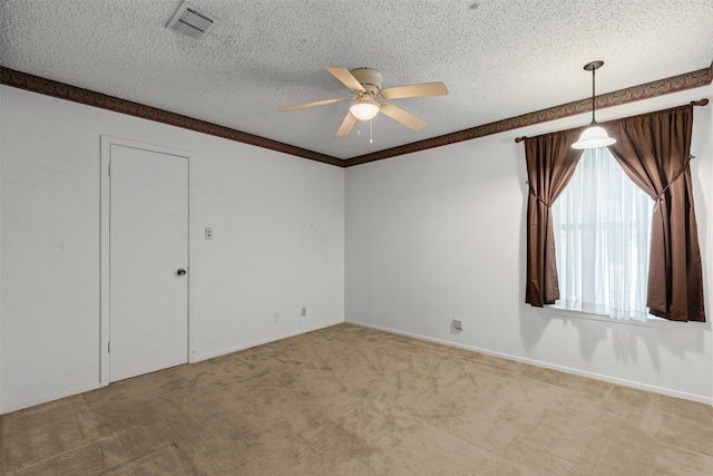 4611 Francis Ct, Granbury, TX 76049 - carpeted spare room featuring a ceiling fan, a textured ceiling, ornamental molding, and baseboards