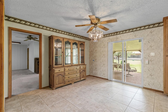 4611 Francis Ct, Granbury, TX 76049 - unfurnished room with a ceiling fan, a textured ceiling, light tile patterned floors, and baseboards