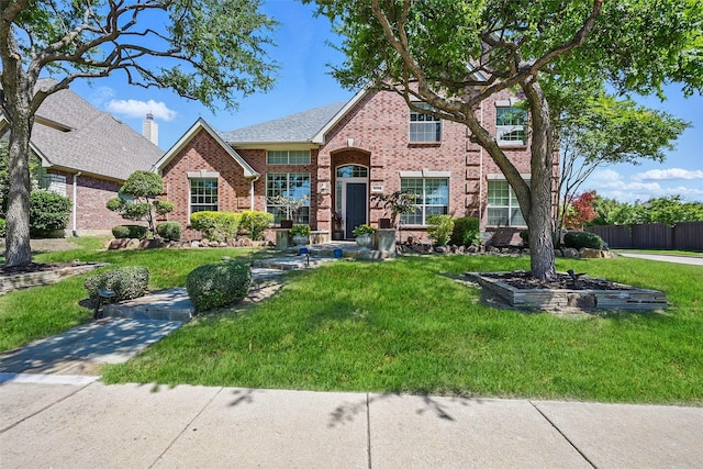 14766 Daneway Dr, Frisco, TX 75035 - traditional home featuring brick siding