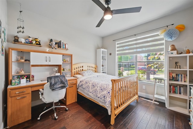 14766 Daneway Dr, Frisco, TX 75035 - bedroom with dark wood finished floors, a desk, and a ceiling fan