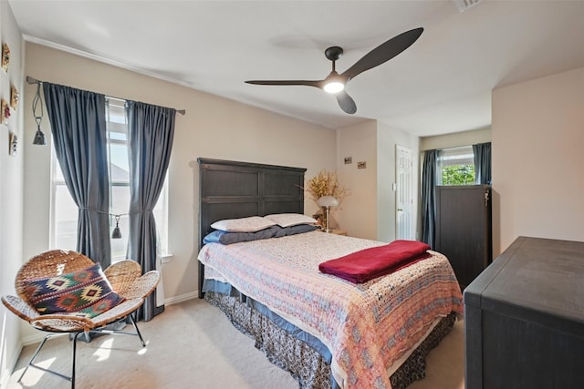 14766 Daneway Dr, Frisco, TX 75035 - bedroom with light colored carpet, ceiling fan, and a closet
