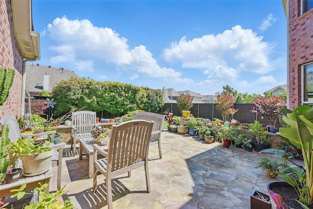 14766 Daneway Dr, Frisco, TX 75035 - fenced backyard featuring outdoor dining area and a patio