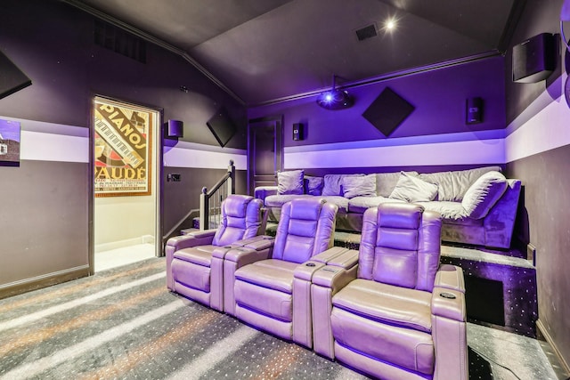 7012 Mills Branch Cir, Plano, TX 75024 - cinema room featuring lofted ceiling, carpet flooring, and baseboards