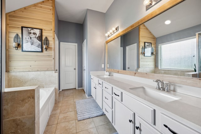 201 E St, Josephine, TX 75173 - full bath featuring wooden walls, tile patterned flooring, double vanity, a bath, and baseboards