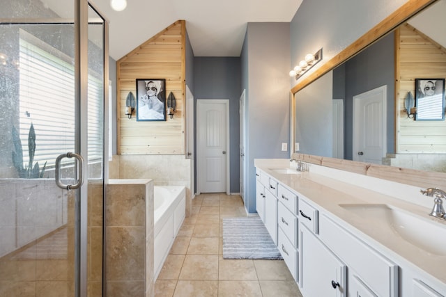 201 E St, Josephine, TX 75173 - bathroom with wood walls, a garden tub, a stall shower, tile patterned floors, and double vanity