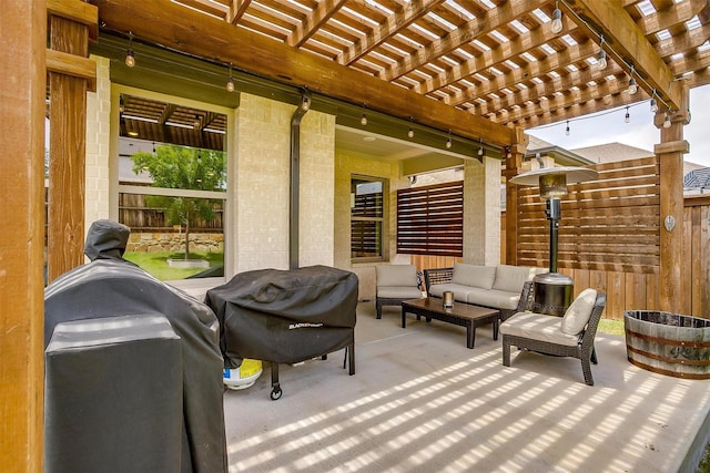 view of patio featuring fence, outdoor lounge area, a pergola, and area for grilling