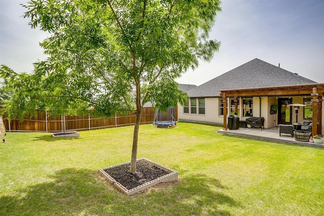 view of yard featuring a trampoline